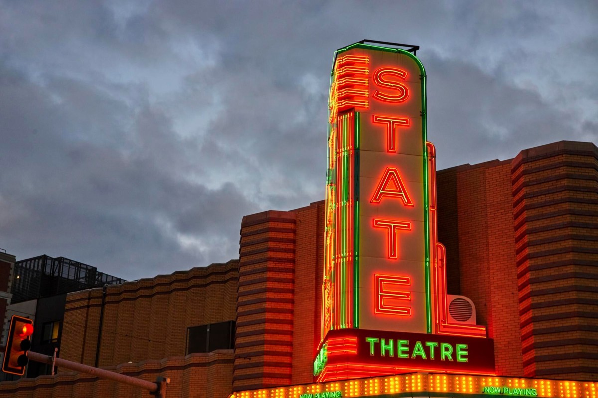 State Theatre Neon Signage at Blue Hour in Urban Setting